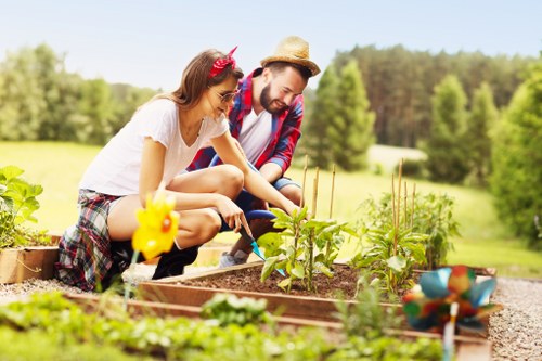 Landscaping team reviewing ethical labour practices